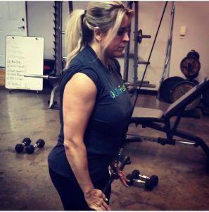 Women over 40 lifting weights out to improve bone density and health